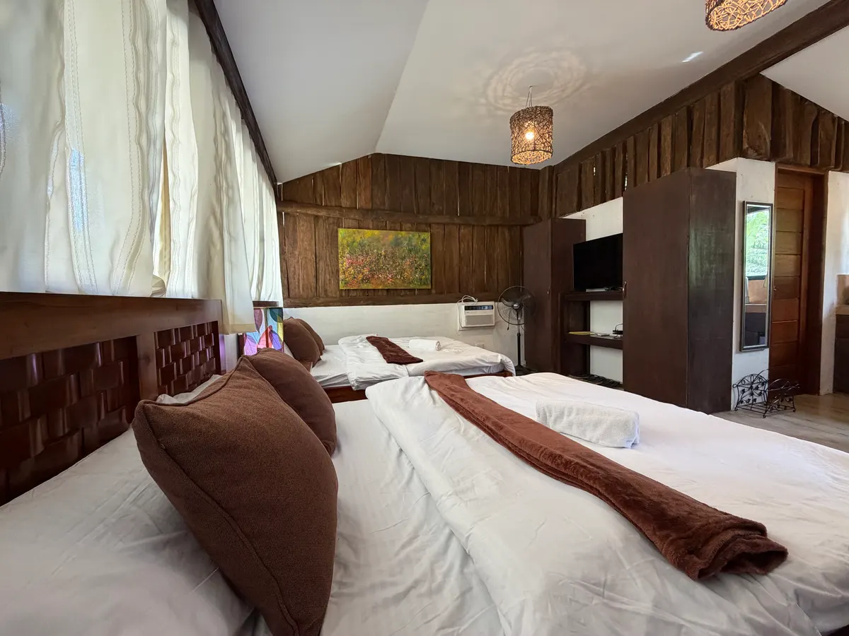 Bedroom area inside the main cabin at San Jose Cabins